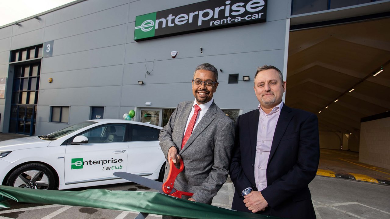 16.12.22 - Picture shows Minister for the Economy of Wales Vaughan Gething and Randall Rickabaugh at the new site opening of Enterprise rent-a-car in Cardiff, South Wales.